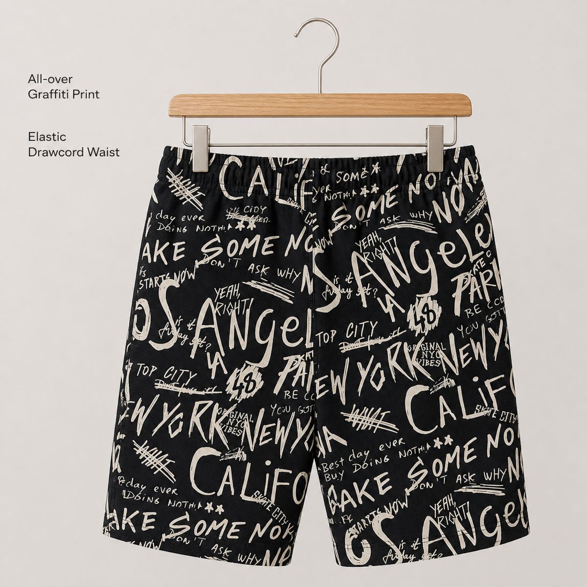 H&M กางเกงขาสั้นพิมพ์ตัวอักษรสีดำ